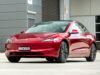 Tesla income falls as revenues rise in Q3